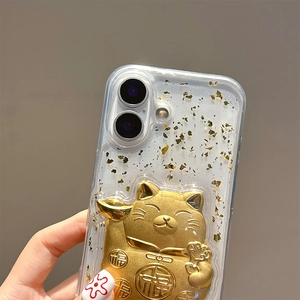 Detail of 3D gold Maneki Neko lucky cat with gold foil on transparent phone case