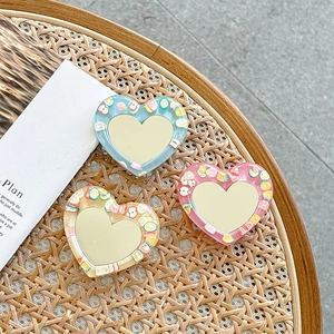 Glitter heart phone socket with fruit slices in blue, pink, and yellow colors
