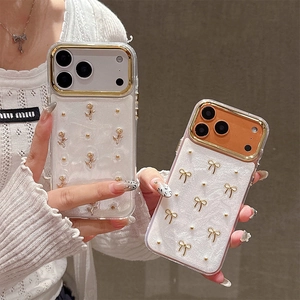 Luxe iPhone case with 3D gold rose and bow motifs on a glittery semi-transparent back