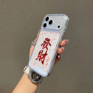 Detail of red glitter iPhone case featuring embossed Chinese characters for wealth