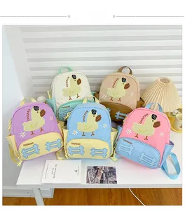 Detailed collection of colorful toddler backpacks with cartoon duck and side water bottle pocket