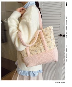 Detail of plush bear printed tote bag featuring soft pink trim and large capacity for kids