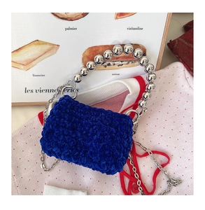 Blue hand-crocheted mini handbag for girls with large silver beaded handle and chain strap