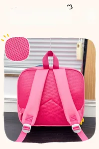 Detail of pink toddler backpack showing breathable honeycomb mesh back and padded straps