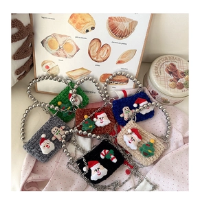 Handmade crochet Christmas mini bags with festive 3D elements and beaded metal handles