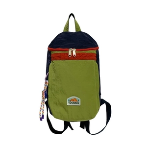 Kids lightweight nylon backpack in green and blue colorblock with orange accents