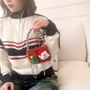 Kids mini knitted Christmas handbag with reindeer Santa motif and silver beaded handle