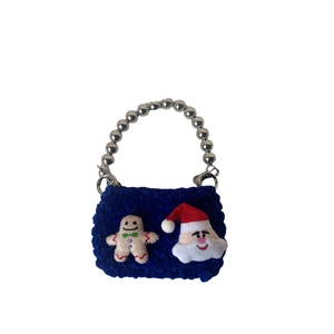 Knitted Christmas handbag for kids with gingerbread man and beaded handle in navy blue