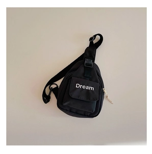 Detail of black mini crossbody bag with Dream letter print and adjustable buckle strap