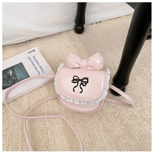 Close-up of pink toddler purse with large 3D bow, lace trim and butterfly embroidery