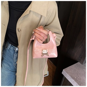 Pink mini crossbody bag featuring 3D plush bear head and checkered bow for girls