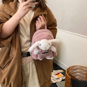 Cute pink plush bunny backpack for kids featuring long-eared rabbit doll and metal zippers