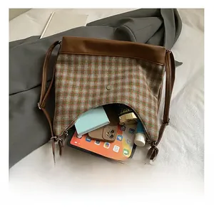 Internal view of vintage plaid tote bag showing large capacity for tablet and daily items