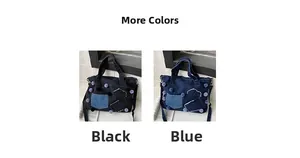 Dettaglio borse in denim nero e blu con design patchwork e pompon a pois decorativi