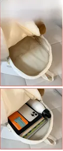 Detailed internal view showing large capacity and soft lining of plush puppy backpack