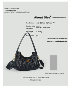 Detail view of black quilted hobo bag showing 23x12x7cm dimensions and removable strap