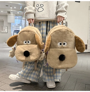 Detail of cute dog plush backpack featuring adjustable straps and soft texture