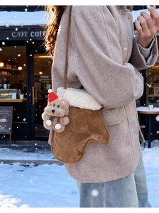Brown plush glove-shaped crossbody bag with a cute Christmas bear doll charm for winter
