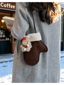 Winter brown glove-shaped crossbody bag with white sherpa trim and bear plush charm