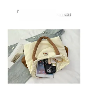 Interior view of kids tote bag showing large capacity for tablet and accessories