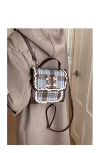 Checkered vintage school backpack for kids with lace trim and twin bow details