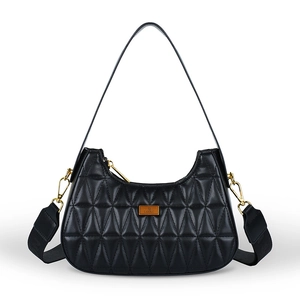 Black quilted hobo shoulder bag with geometric stitching and gold logo detail