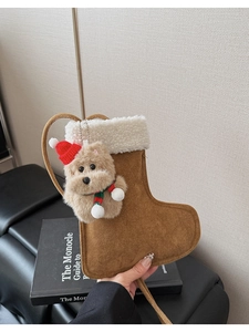 Detail of Christmas stocking mini bag with cute teddy bear and fuzzy white trim