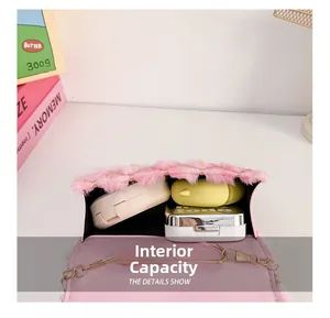 Detail view of the interior capacity of the pink plush mini bear bag for girls