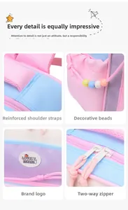 Détails du sac à dos enfant rose et bleu avec bretelles renforcées et pompons colorés
