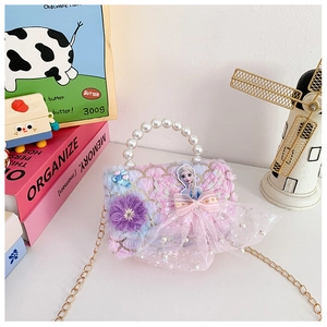 Detail of plush Elsa princess bag with pearl handle and gradient sequins for girls