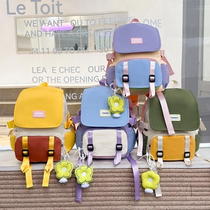 Cartable Pour Enfants En Tissu Oxford Sac À Dos Color Block Avec Pendentif Fleur Mignon Pour Garçons Et Filles