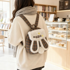 Cute bunny shaped mini backpack for women with orange plaid fabric and white plush ears