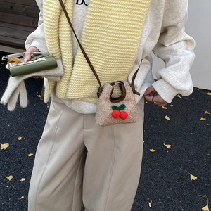 Kids plush cherry crossbody bag with brown leather strap and khaki faux fur finish