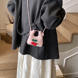 Pink plush cherry shoulder bag for kids with soft faux fur texture and red cherry decor