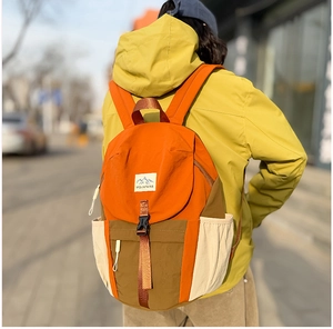 Detail view of large-capacity three-color patchwork outdoor backpack for children