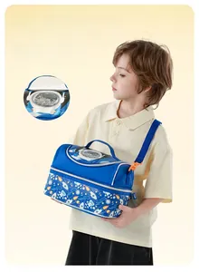Detail of blue rocket themed kids lunch bag with astronaut print and adjustable strap