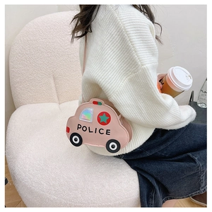 Detail of pink cartoon police car shoulder bag for kids with star and wheel accents