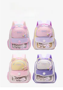 Detail view of four colorful cartoon schoolbags with cute bear ears and plush toy windows