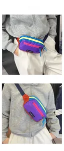 Detail view of multi-color nylon waist bag showing adjustable straps and zippers