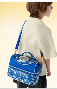 Detail of space-themed kids lunch bag featuring smooth zippers and astronaut prints