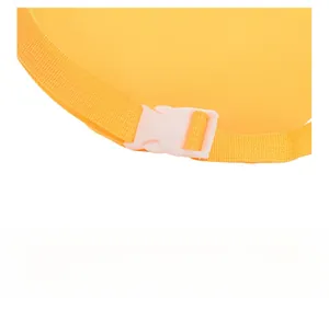 Detail shot of bright yellow nylon webbing with a sturdy white plastic buckle closure
