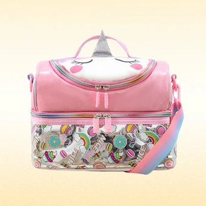 Detail of glitter unicorn lunch bag with pink sequins, double zippers, and rainbow strap