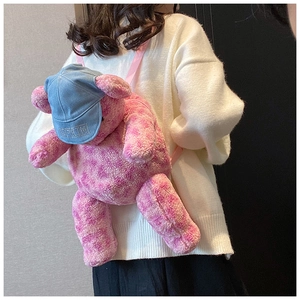 Vista posteriore dello zaino orsetto di peluche leopardato con berretto in denim e strass