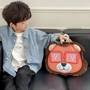 3D cartoon lion toddler backpack in vibrant orange with red glasses for boys and girls