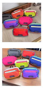 Detail of colorful nylon kids waist bags with adjustable straps and zip pockets