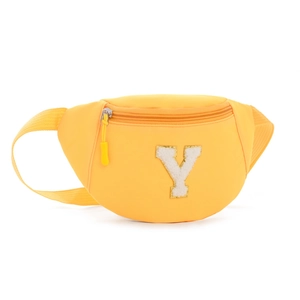 Detail of yellow nylon waist bag for kids featuring a large white 'Y' letter patch
