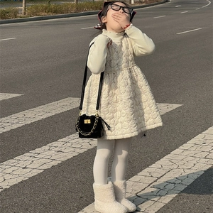 Quilted mini bucket bag with chain strap and chic contrast kids autumn outfit ensemble