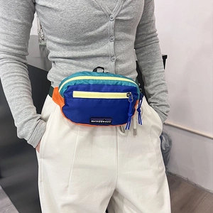Kids colorful outdoor waist bag with multi-color nylon stitching and mountain logo patch