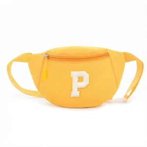 Detail of yellow nylon waist bag for kids featuring a plush letter P embroidery patch