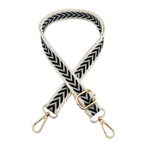 Adjustable wide jacquard bag strap with black and white chevron pattern and gold hooks